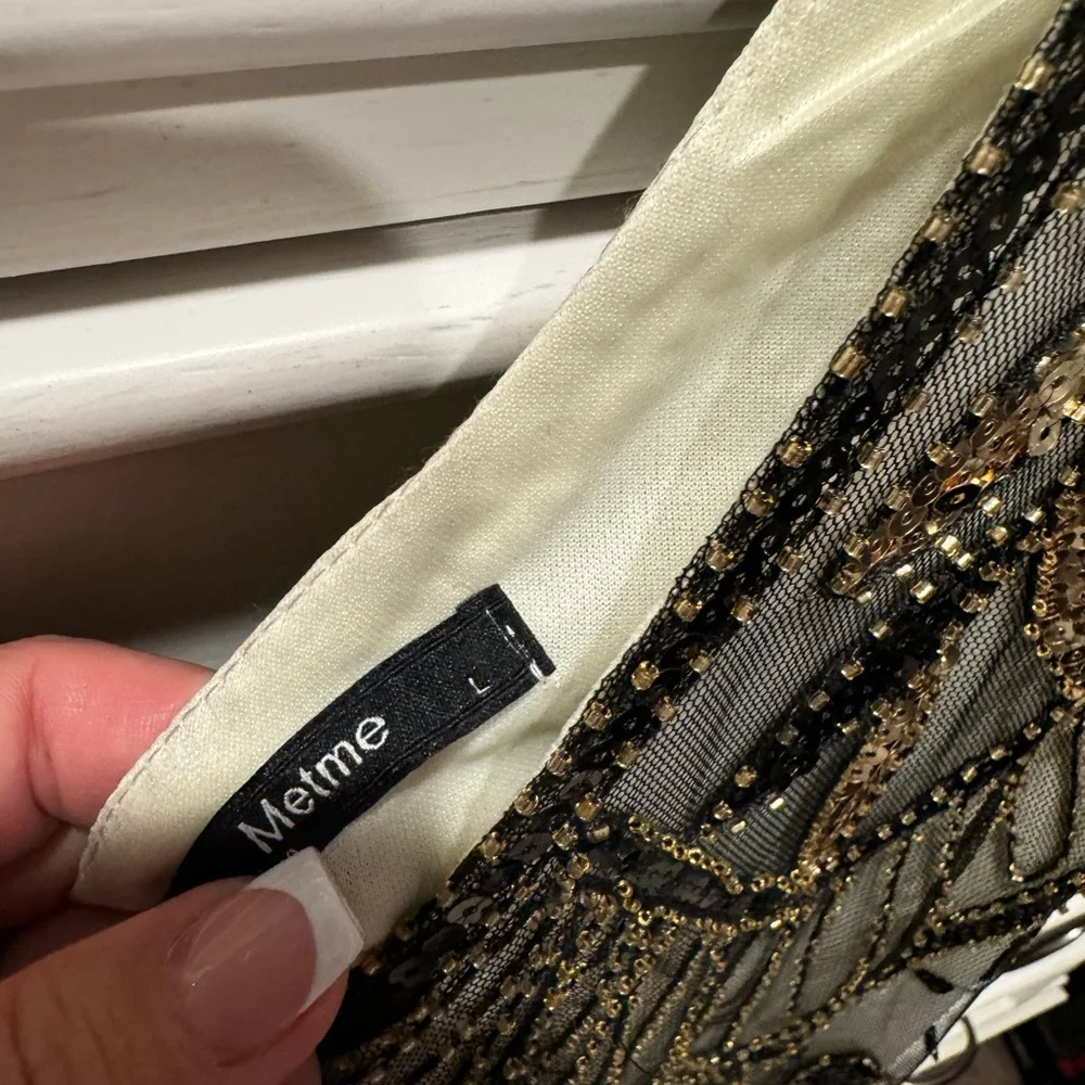 Elegant Black and Gold Embellished Dress - Picture 4 of 7